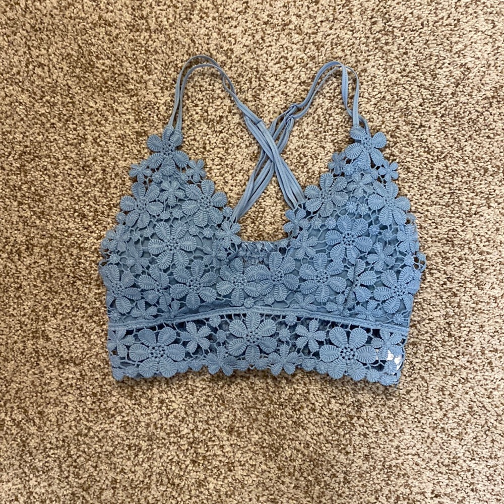 Woman’s blue flower top